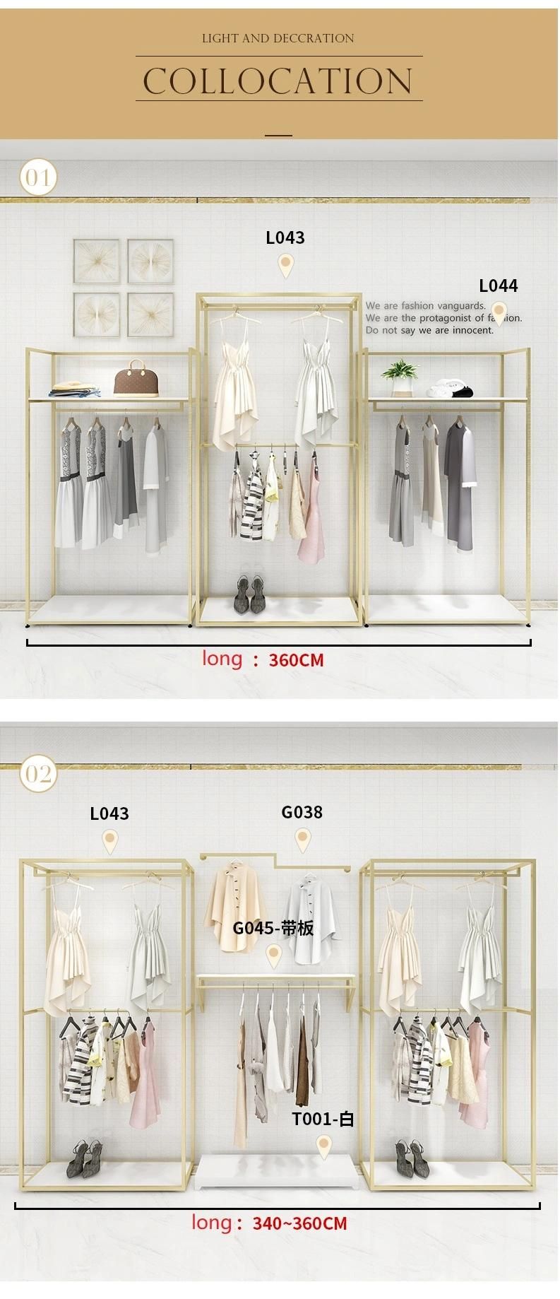 Custom Boutique Gold Clothing Wall Mounted Rack Nesting Table Clothes Shelving Garment Display